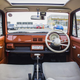 Illustration for article titled And now... Orange Nissan Pao with a sun roof!!
